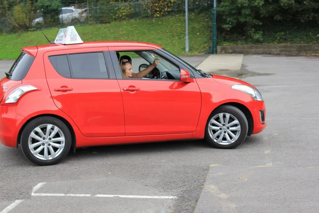 Photo of young person having a driving experience